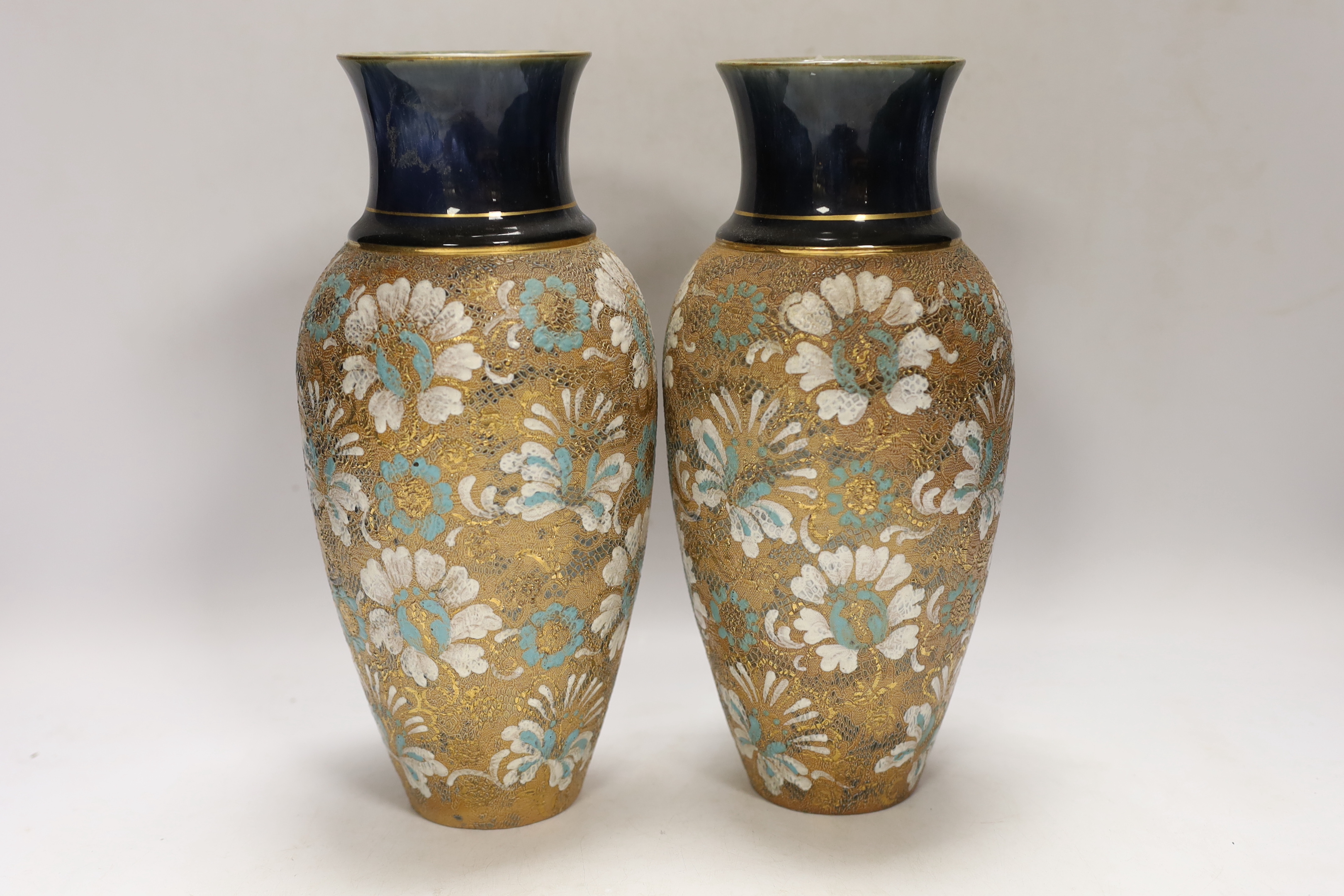 A pair of Royal Doulton Slaters stoneware vases, 28cm high